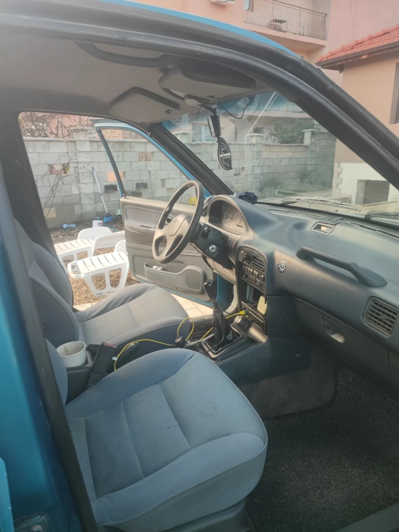 Kia Sportage 2.0, снимка 14 - Автомобили и джипове - 52616386