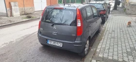 Mitsubishi Colt 1, 5 D  - 910 € / 1779.81 лв. - 32027855 2