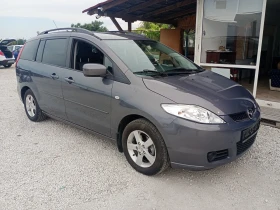     Mazda 5 1.8 . .