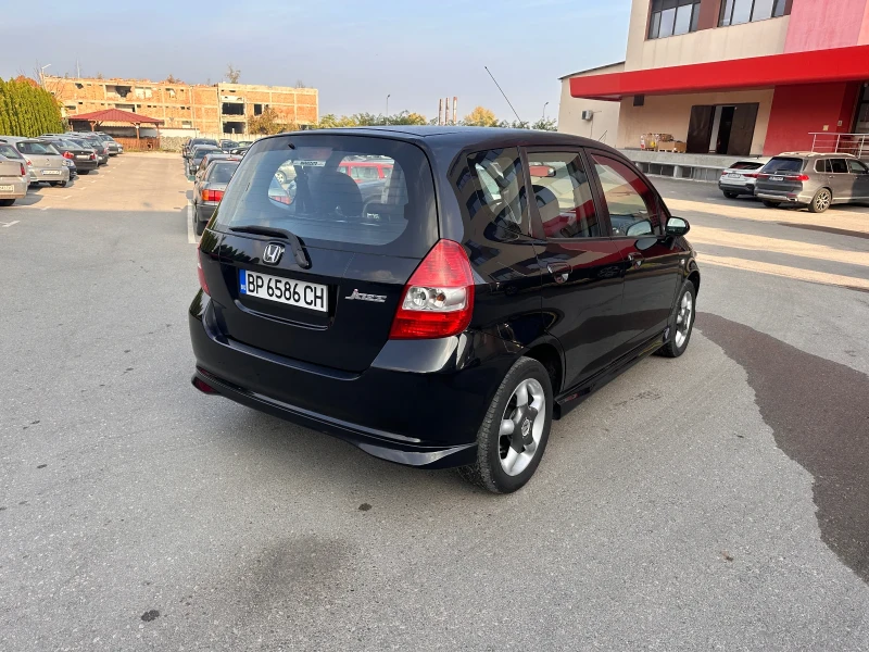 Honda Jazz 1.4i - КЛИМАТИК - РЕАЛНИ КИЛОМЕТРИ, снимка 5 - Автомобили и джипове - 47757196