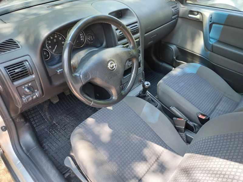 Opel Astra, снимка 12 - Автомобили и джипове - 51487613