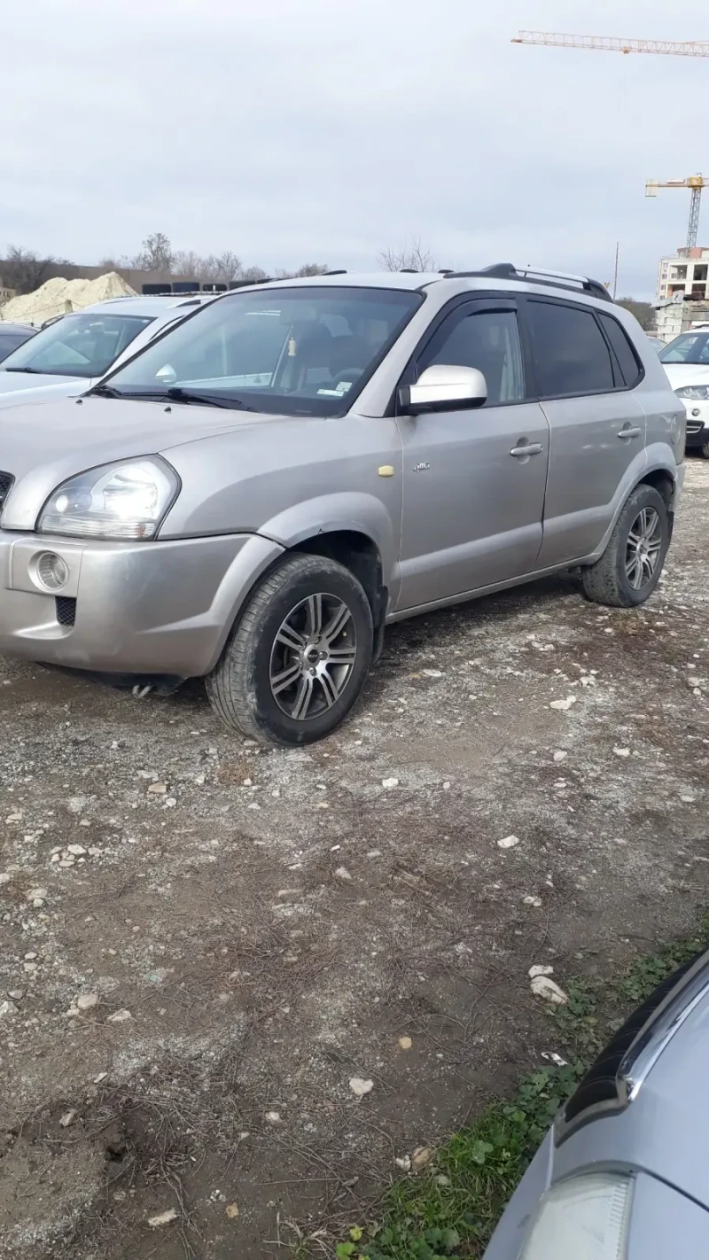 Hyundai Tucson 2.0 i Gaz 4x4, снимка 4 - Автомобили и джипове - 48248795