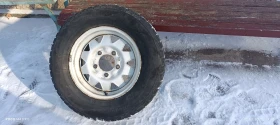 Гуми с джанти Други 215/70R15, снимка 1 - Гуми и джанти - 48557027