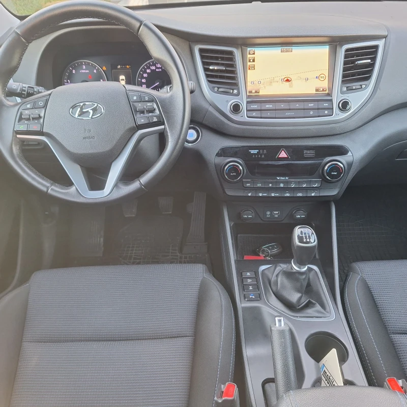 Hyundai Tucson 2.0 4х4 ръчка, снимка 13 - Автомобили и джипове - 52905948