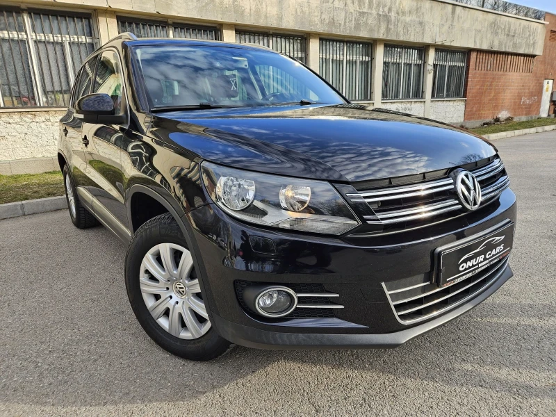 VW Tiguan 2.0 TDI /4x4/XENON/NAVI/176.000км/ТОП СЪСТОЯНИЕ , снимка 1 - Автомобили и джипове - 49424020