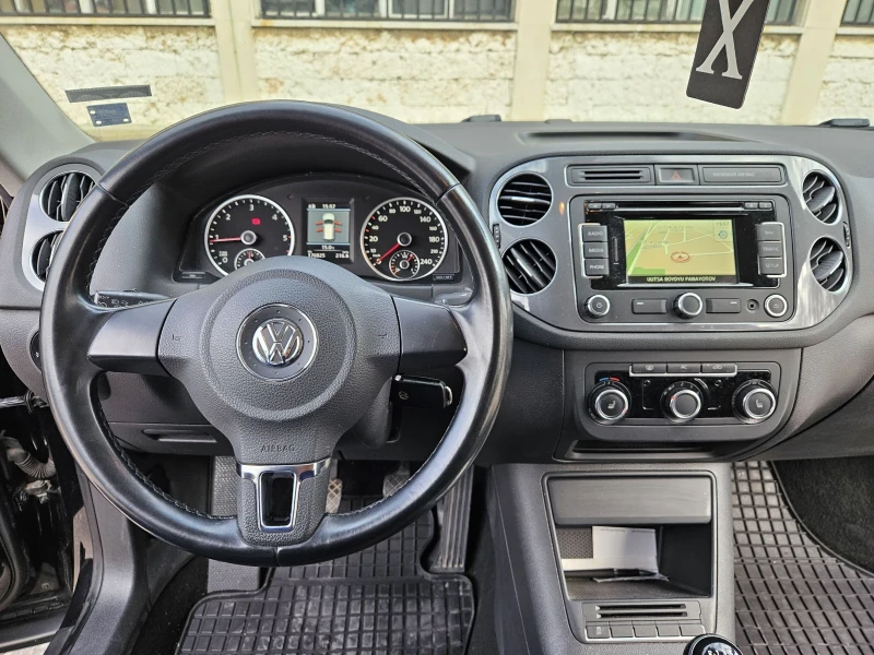 VW Tiguan 2.0 TDI /4x4/XENON/NAVI/176.000км/ТОП СЪСТОЯНИЕ , снимка 9 - Автомобили и джипове - 49424020