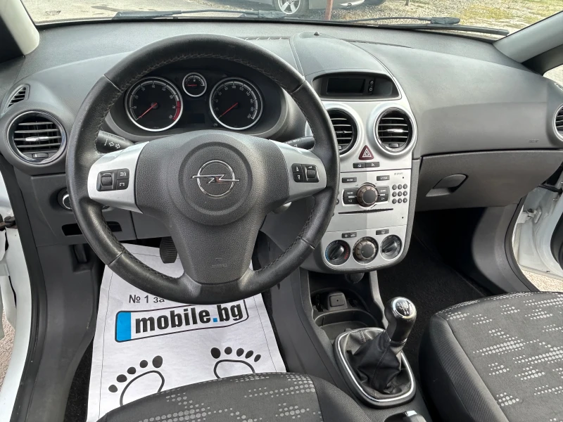 Opel Corsa 1.2i 85k.c., снимка 11 - Автомобили и джипове - 47120989