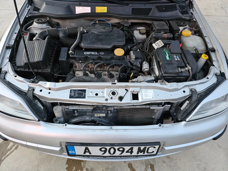 Opel Astra, снимка 12 - Автомобили и джипове - 48085545