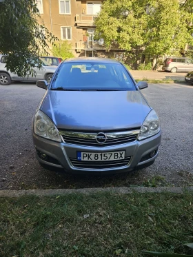     Opel Astra 1.6i. 