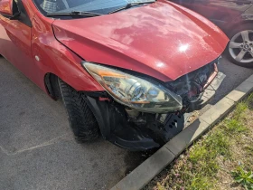 ������ Mazda 3