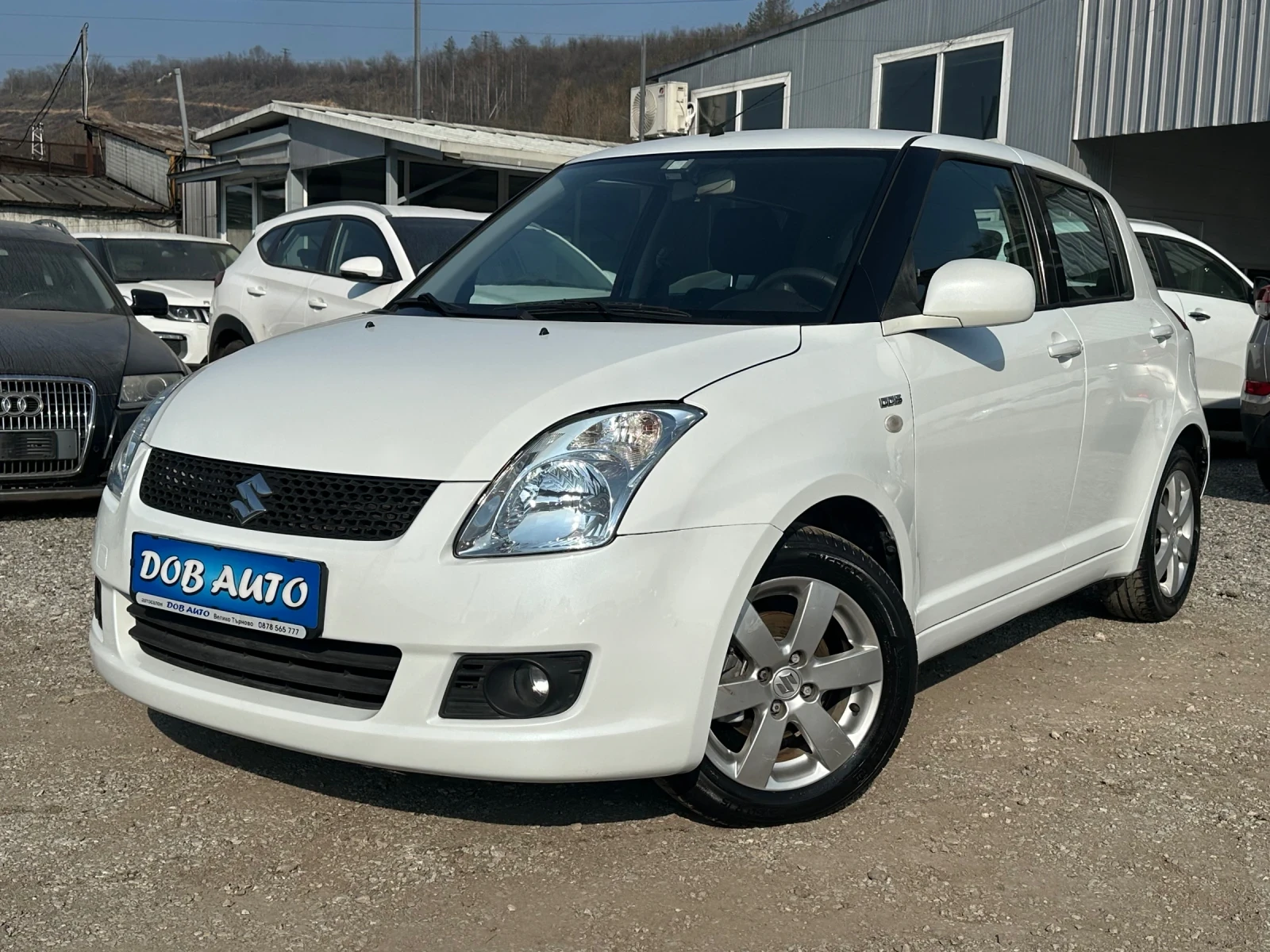 Suzuki Swift 1.3MJT-75к.с-БЯЛА ПЕРЛА