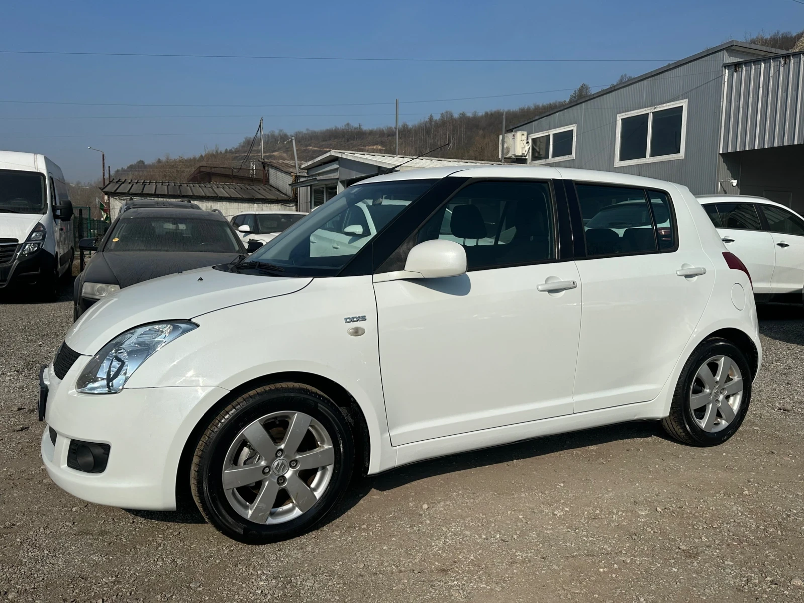 Suzuki Swift 1.3MJT-75к.с-БЯЛА ПЕРЛА, снимка 2 - Автомобили и джипове - 53731990