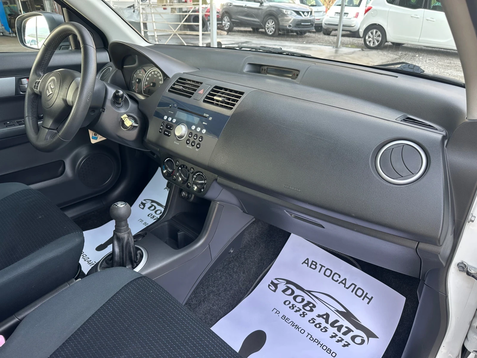 Suzuki Swift 1.3MJT-75к.с-БЯЛА ПЕРЛА, снимка 15 - Автомобили и джипове - 53731990