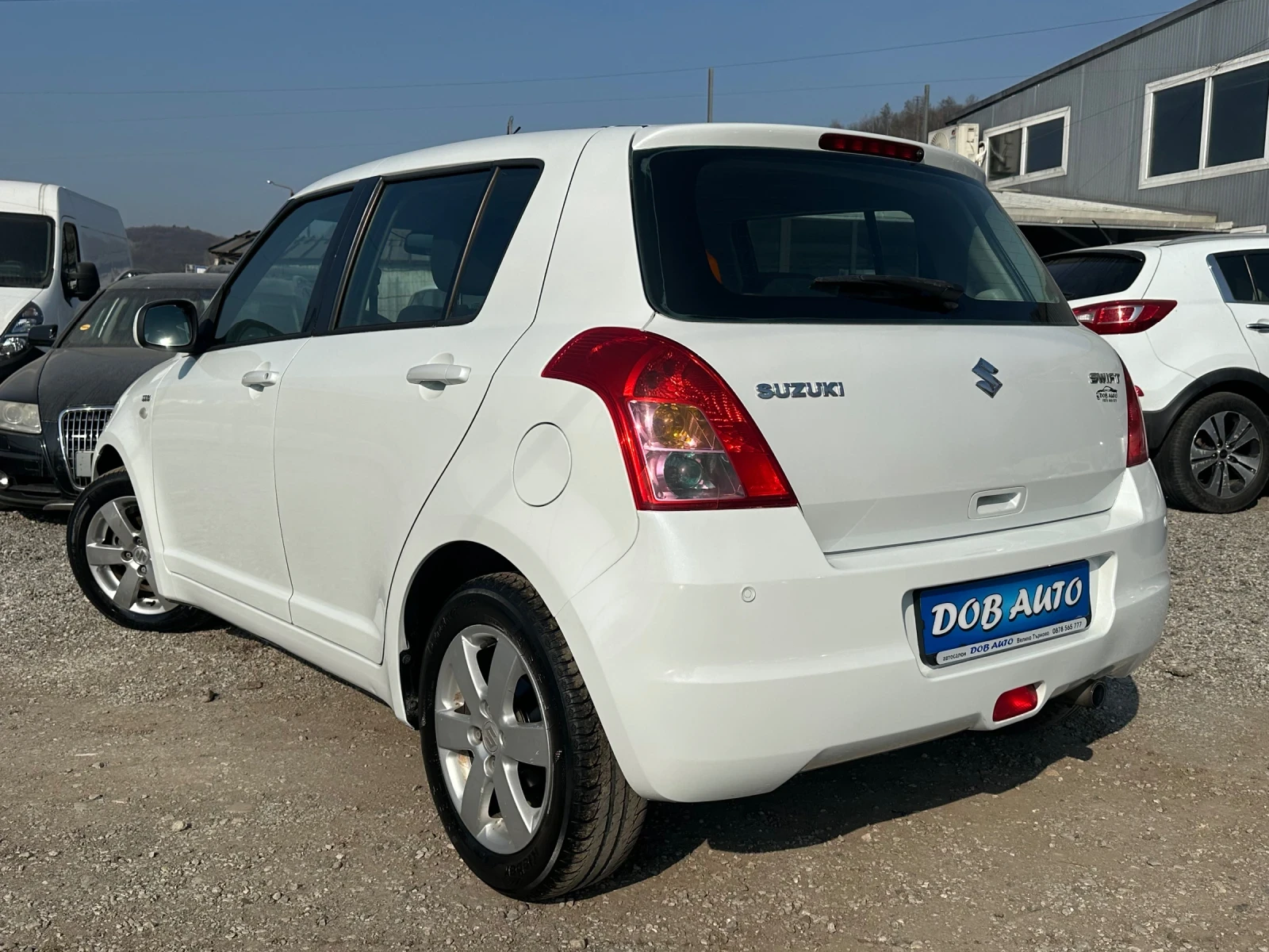 Suzuki Swift 1.3MJT-75к.с-БЯЛА ПЕРЛА, снимка 3 - Автомобили и джипове - 53731990