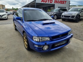     Subaru Impreza // ~9 999 .