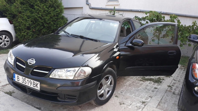 Nissan Almera, снимка 6 - Автомобили и джипове - 47608634