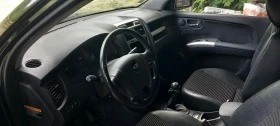 Kia Sportage 2.0 CRDI/Автоматик/Лети джанти 16, снимка 11