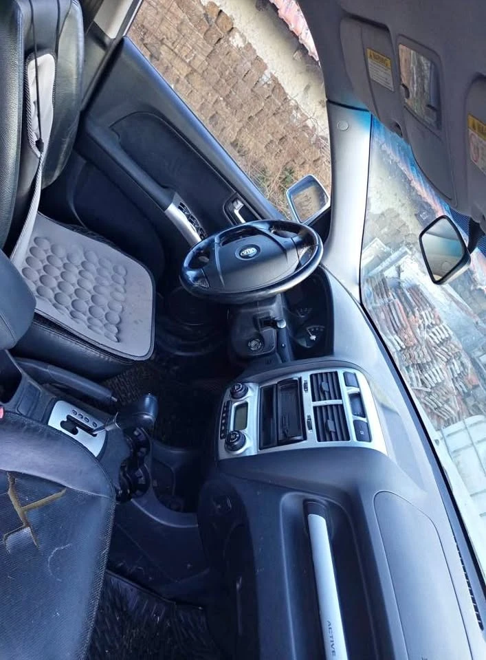 Kia Sportage 2.0 CRDI/Автоматик, снимка 16 - Автомобили и джипове - 51899591