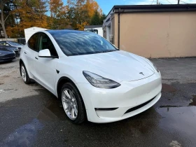 ������ Tesla Model Y