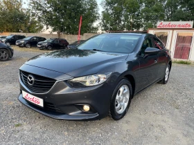 ������ Mazda 6