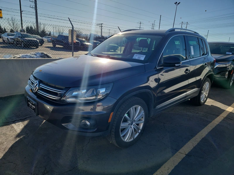 VW Tiguan SE* Подгрев* Navi* Keyless* , снимка 1 - Автомобили и джипове - 48995491