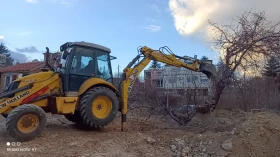      New Holland B100 BLR