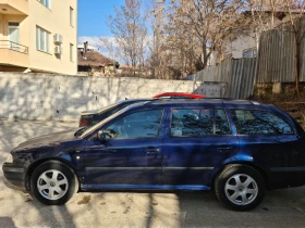 Skoda Octavia 1.6 i 102кс, снимка 15