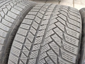 Гуми Зимни 285/40R21, снимка 2 - Гуми и джанти - 43806902