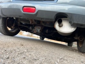 Suzuki Swift 1.3 4х4, снимка 15