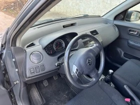 Suzuki Swift 1.3 4х4, снимка 10