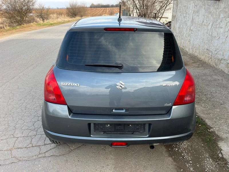 Suzuki Swift 1.3 4х4, снимка 6 - Автомобили и джипове - 47659864