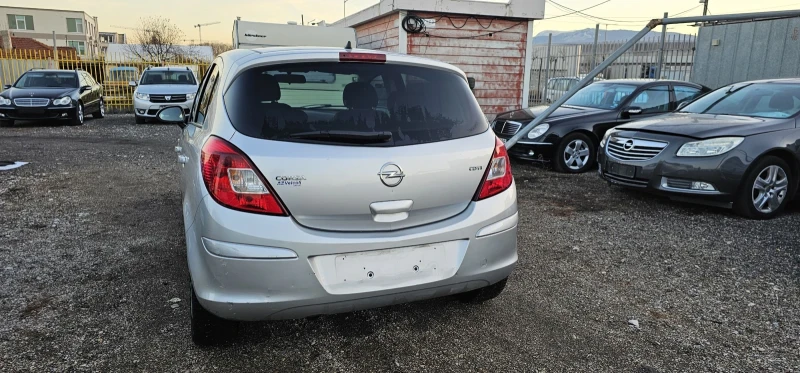 Opel Corsa 1.3cdti , снимка 12 - Автомобили и джипове - 48116311