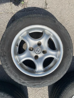 Гуми с джанти Continental 185/60R14, снимка 9 - Гуми и джанти - 49528195