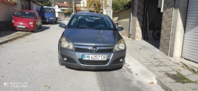 Opel Astra 1.9 CDTI, снимка 1