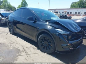 ������ Tesla Model Y