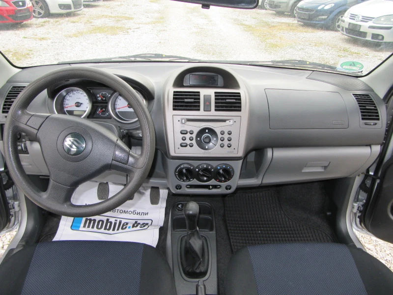 Suzuki Ignis 1.3GL-4WD, снимка 11 - Автомобили и джипове - 45477897