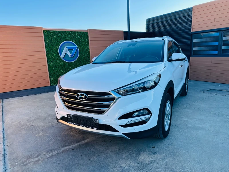 Hyundai Tucson 2.0 CRDI/4x4/Navi/Камера, снимка 1 - Автомобили и джипове - 48325045