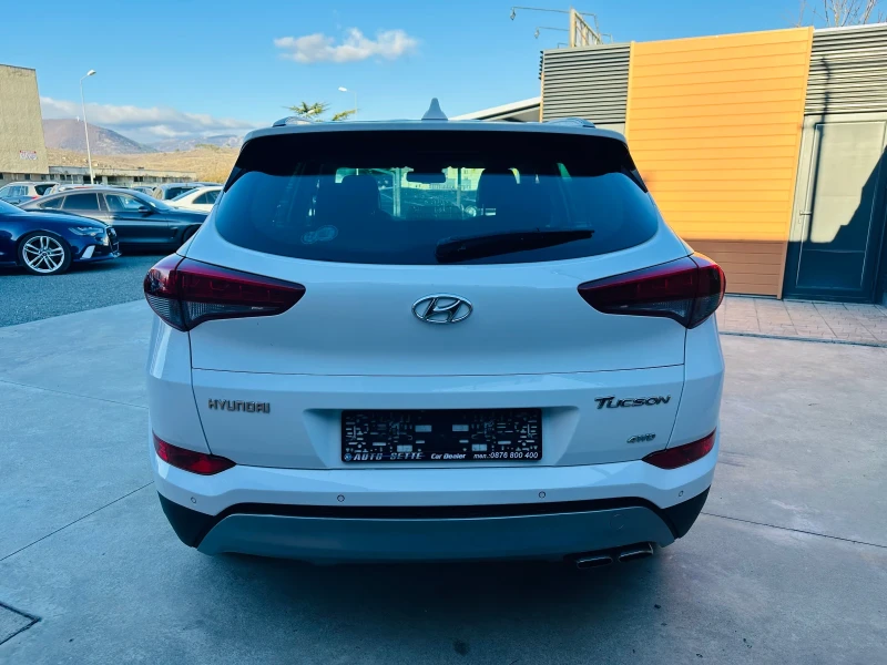 Hyundai Tucson 2.0 CRDI/4x4/Navi/Камера, снимка 6 - Автомобили и джипове - 48325045