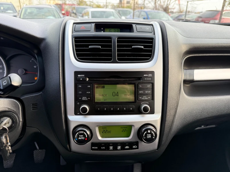 Kia Sportage 2.0crdi 4x4, снимка 10 - Автомобили и джипове - 52496477