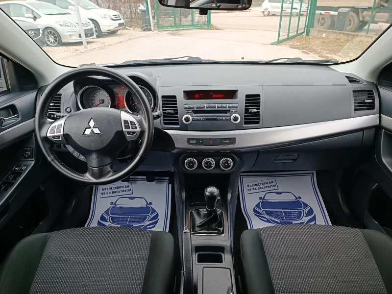 Mitsubishi Lancer 1.8i-143кс-ШВЕЙЦАРИЯ-РЪЧКА, снимка 15 - Автомобили и джипове - 48237527