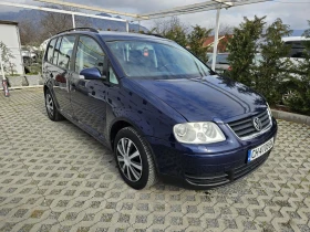 VW Touran 2.0TDI-136кс= 7МЕСТА= НАВИ= ПОДГРЕВ= КСЕНОН, снимка 2