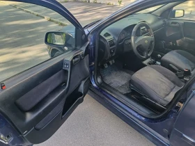 Opel Astra 1.4 i климатик, снимка 6