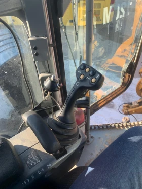 Грейдери Cat 120 М, снимка 9