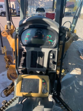 Грейдери Cat 120 М, снимка 11