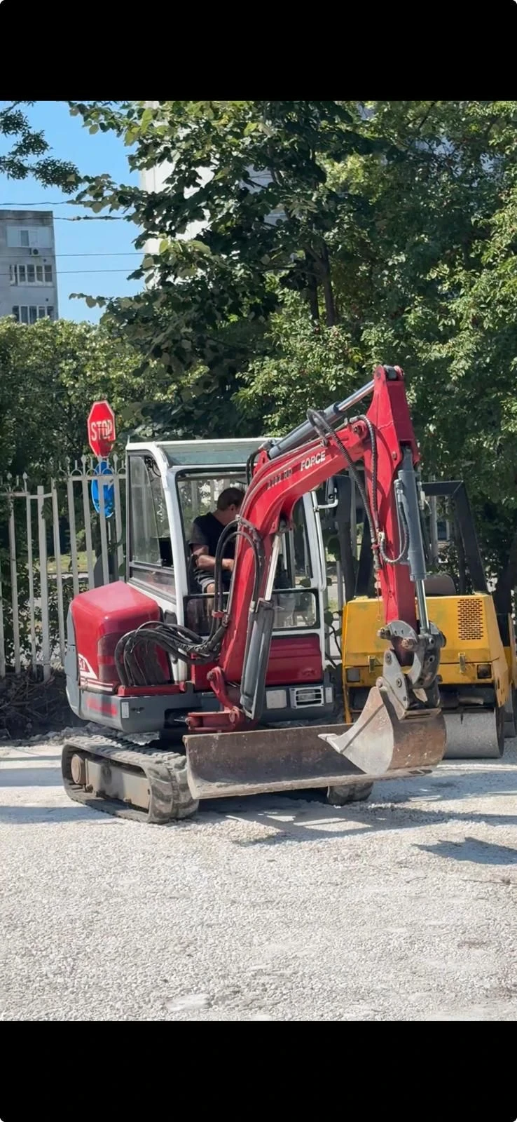 Багер Neuson