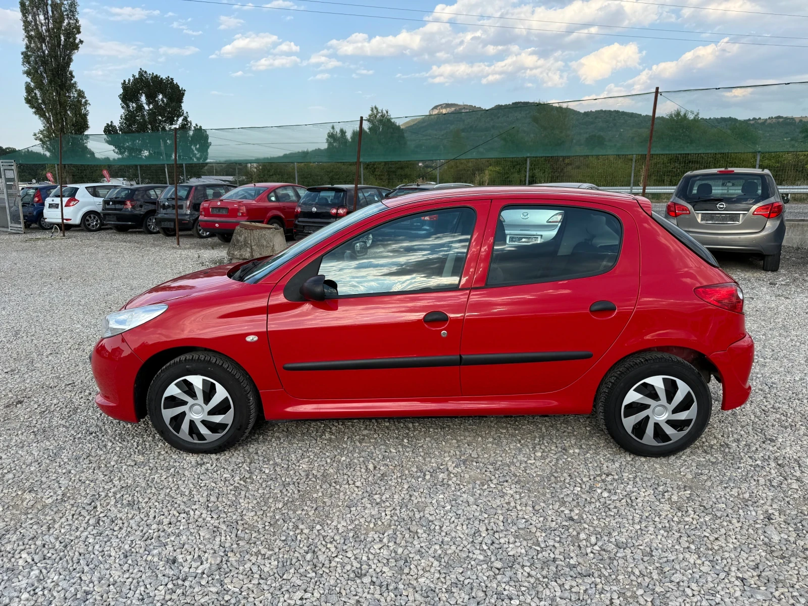 Peugeot 206 + 1.1i-60PS-КЛИМАТИК - изображение 8