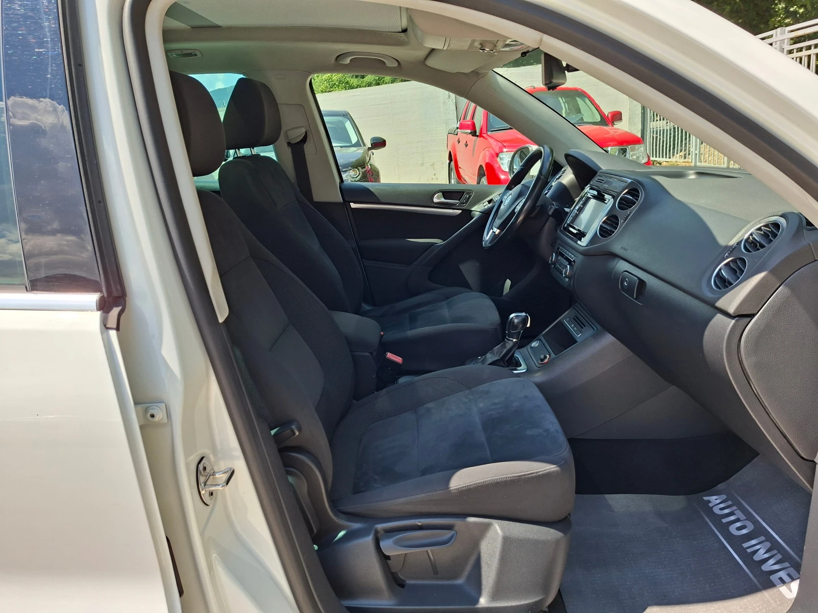 VW Tiguan 4-MOTION, снимка 14 - Автомобили и джипове - 55059803