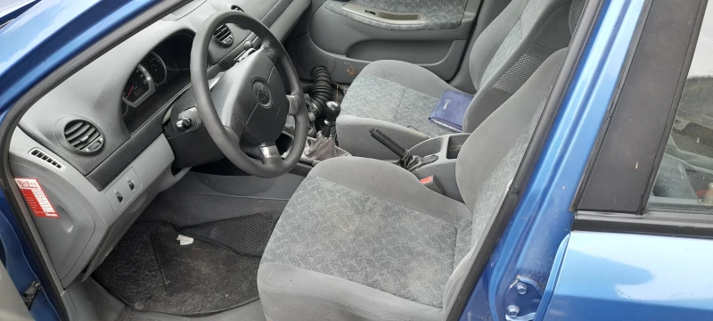 Chevrolet Lacetti 1.4i, снимка 5 - Автомобили и джипове - 51593498