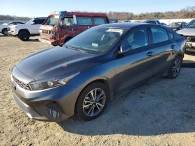 ������ Kia Forte