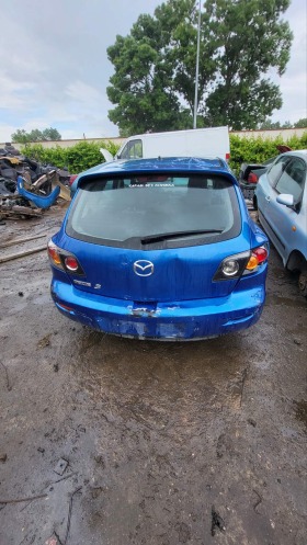     Mazda 3 ~11 .